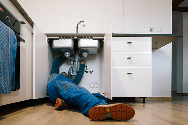 Professional Emergency Plumber technician working in Germantown, MD